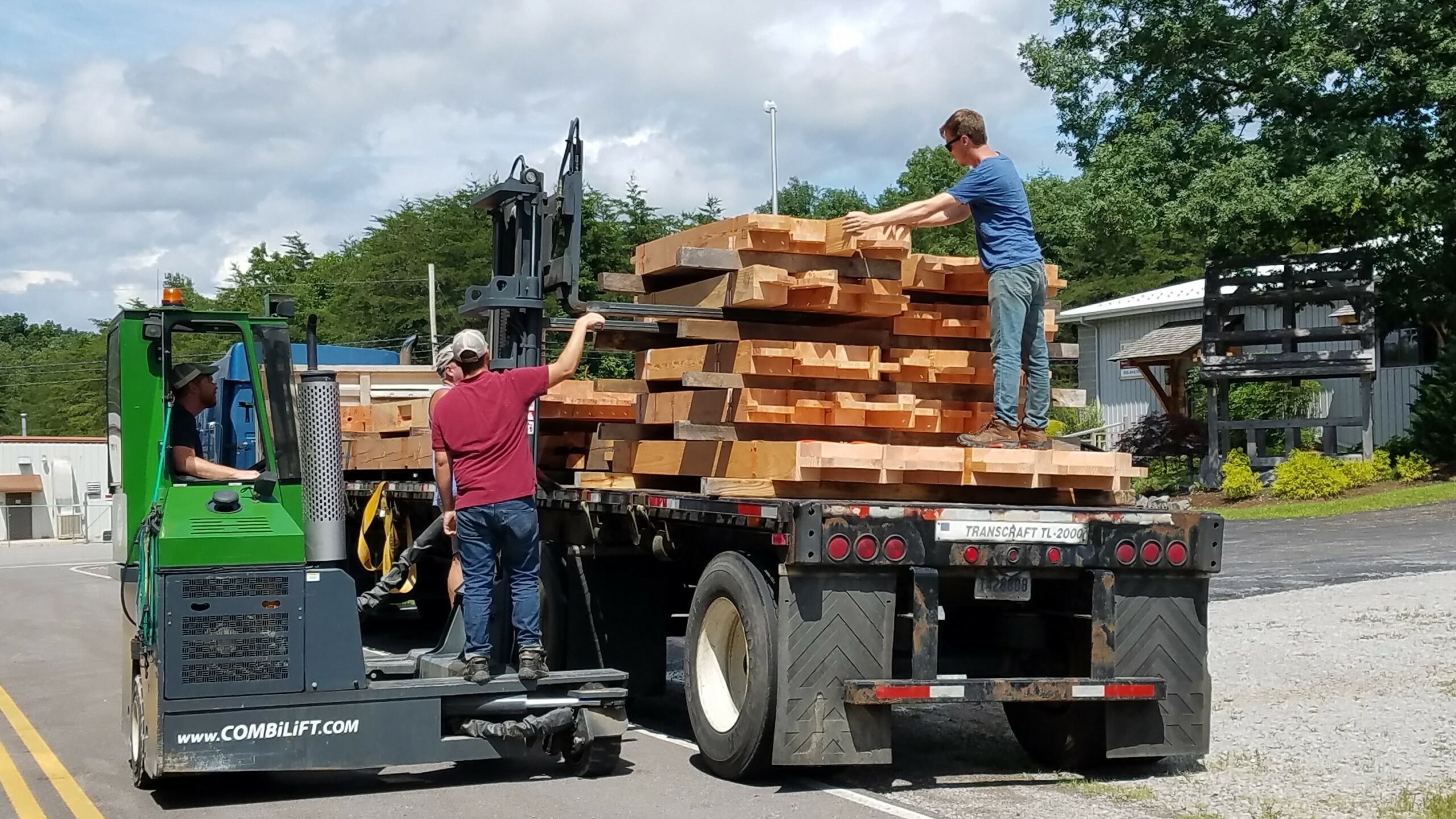 Shipping day underway for custom pavilion timber frame sections.